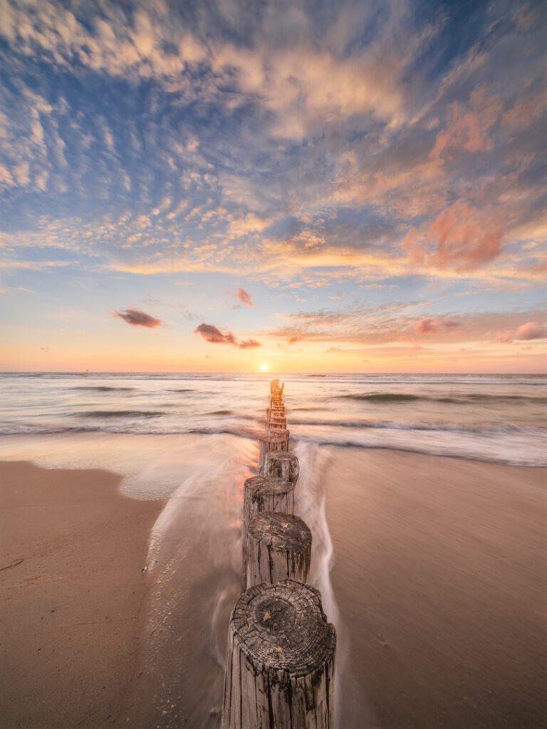 Zonsondergang strand - Ellen van den Doel