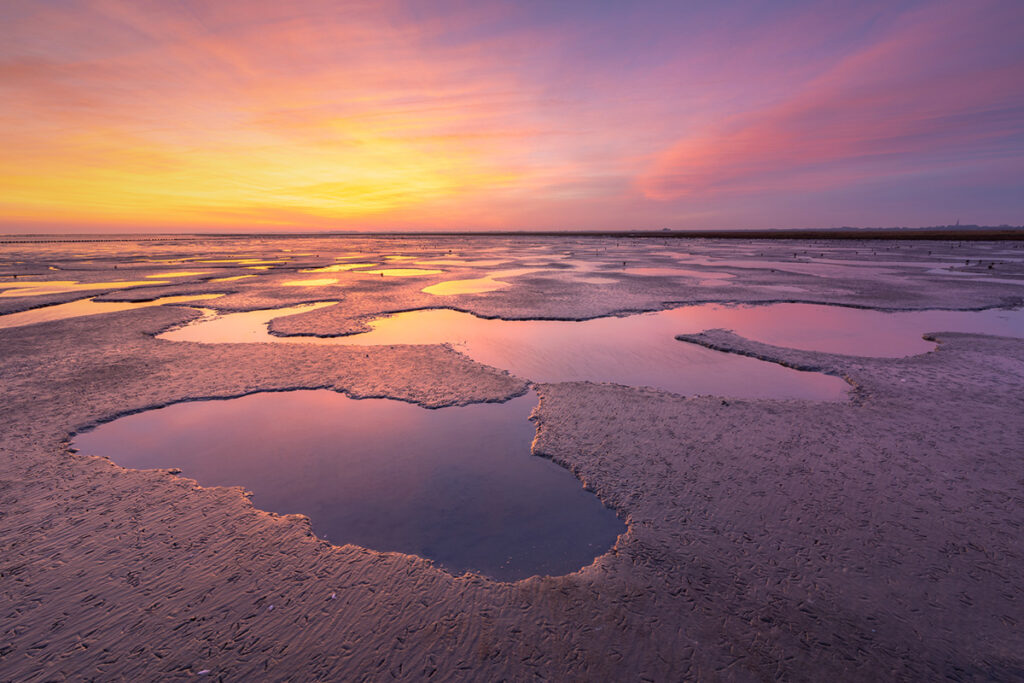 Zonsondergang op het Wad